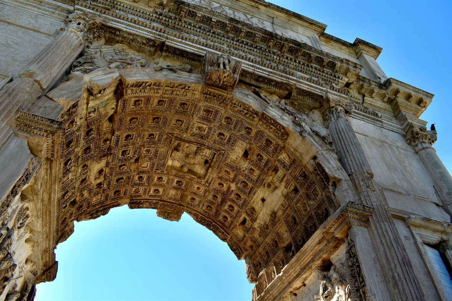 The Arch of Titus in the Forum, raised over a road the legions had marched down.